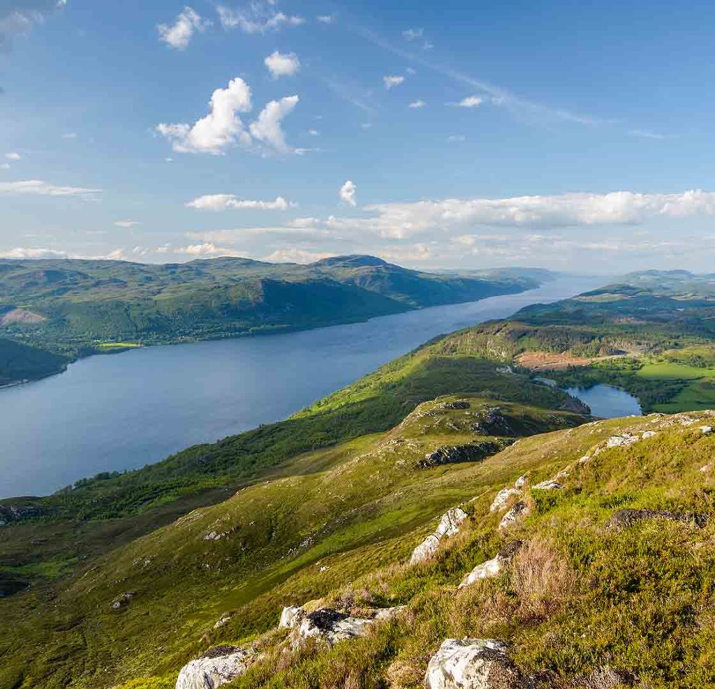 A panoramic view of Loch Ness from a hill