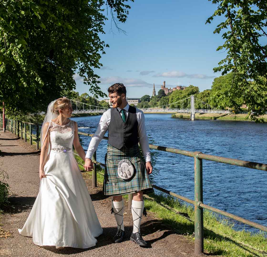 Bride & Groom with Inverness Castle in Background