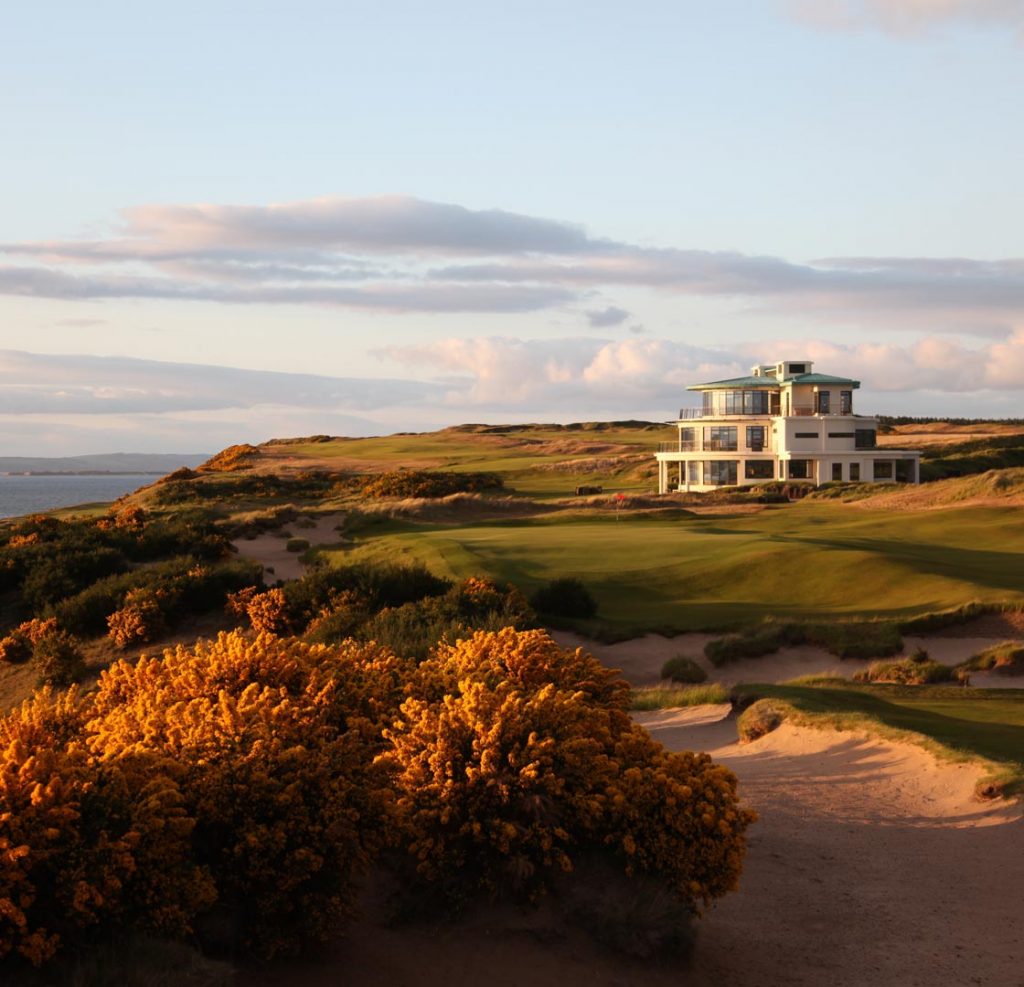 Castle Stuart golf hole with Art Deco clubhouse in the background