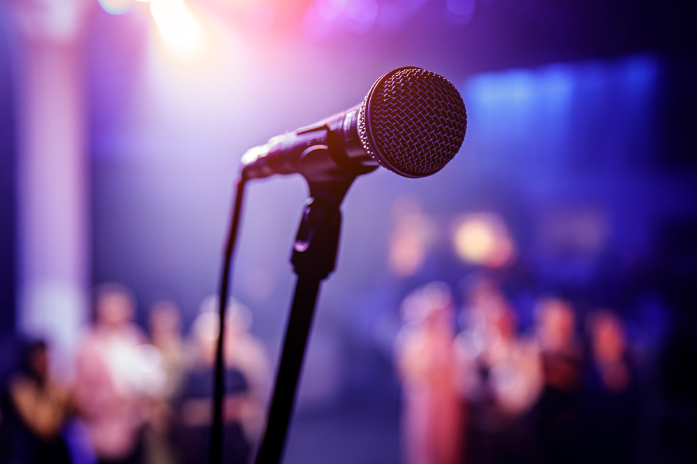 Microphone set up in front of an audience