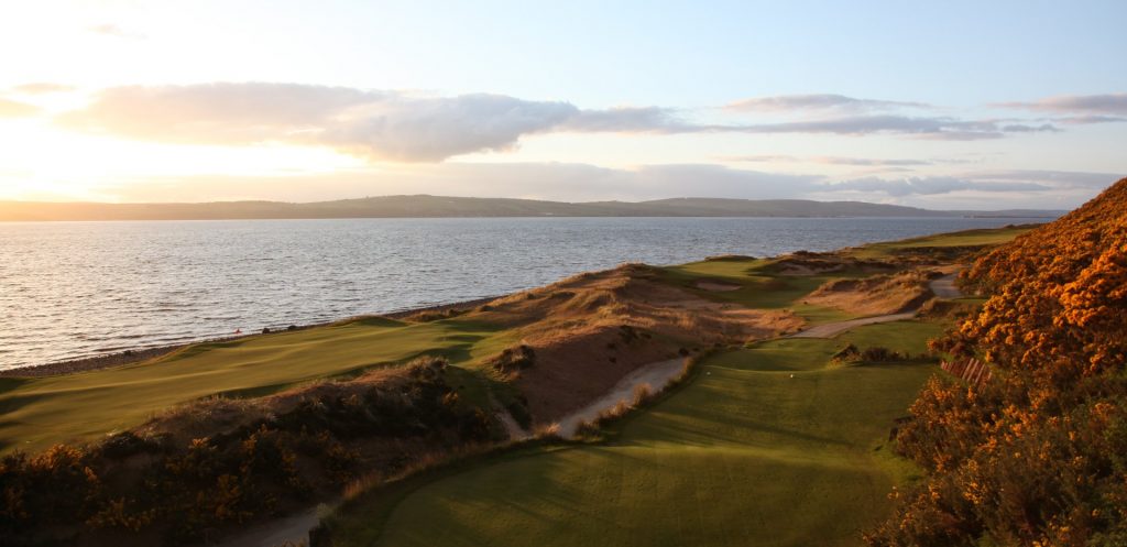 Castle Stuart golf course in the evening overlooking the sea from the 10th and 11th greens
