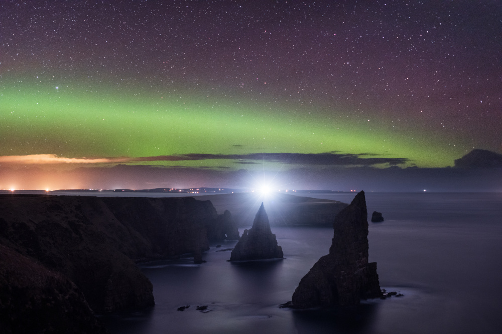 The Northern Lights captured over the Duncansby Stacks on the NC500 route