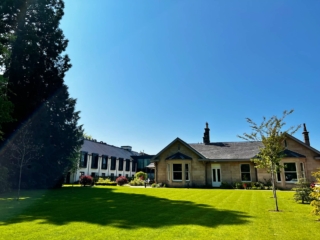 The front exterior of Ness Walk on a sunny day