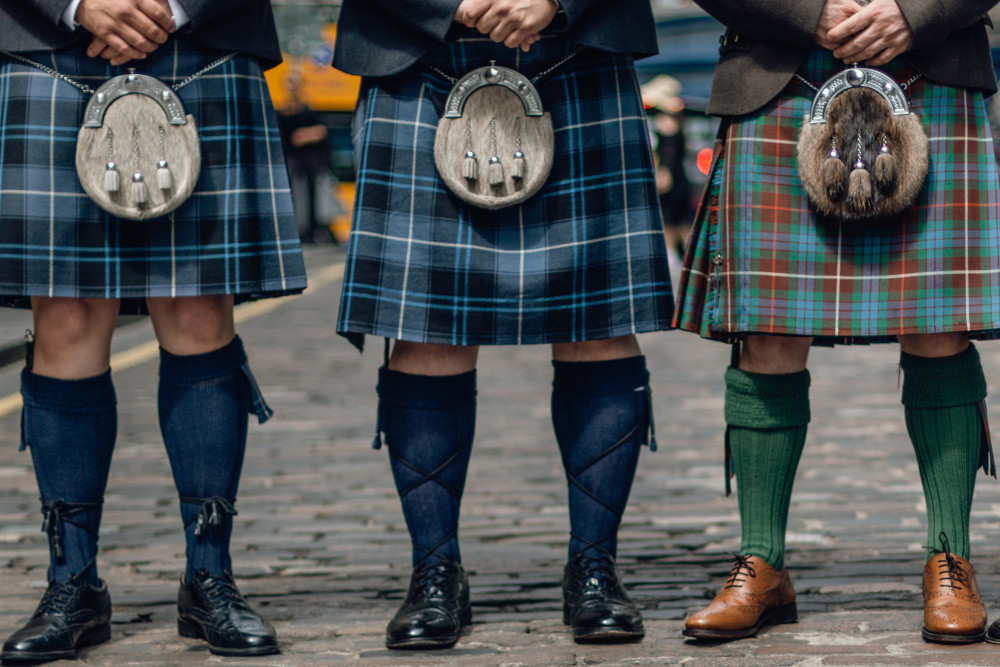 Three Scotsmen in kilts