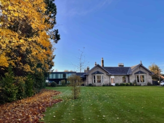 Autumn leaves in front of Ness Walk Hotel