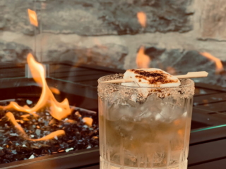 Smokey Ness Cocktail at Torrish bar on the terrace by the fire