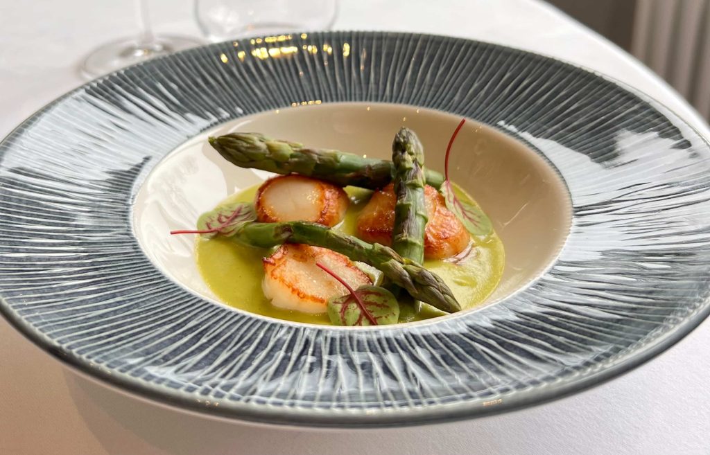 Seared Orkney scallop with asparagus velouté