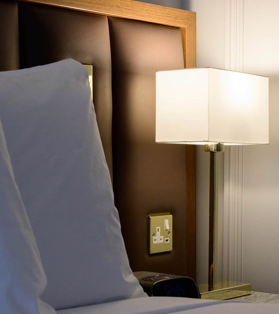 Bedside lamps in every room at Ness Walk Hotel. Bedside lamps in every room at Ness Walk Hotel.
