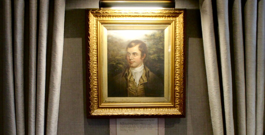 Robert Burns painting hanging in Kingsmills Hotel lobby