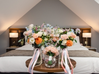 A stunning collection of bridal flowers in the bridal suite at Ness Walk Hotel in the Scottish Highlands.