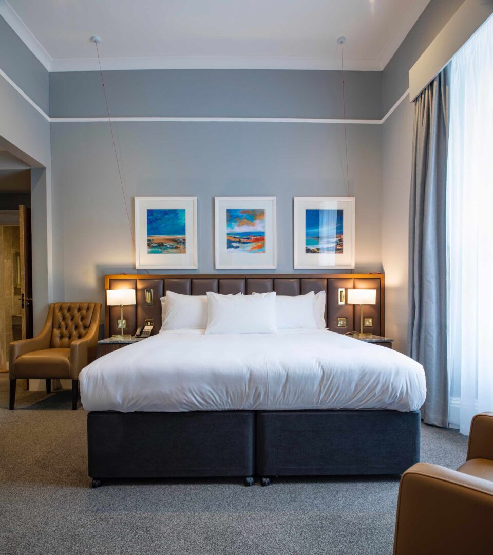 An accessible luxurious room at Ness Walk with king size bed, luxury amenities and space for moving around the room