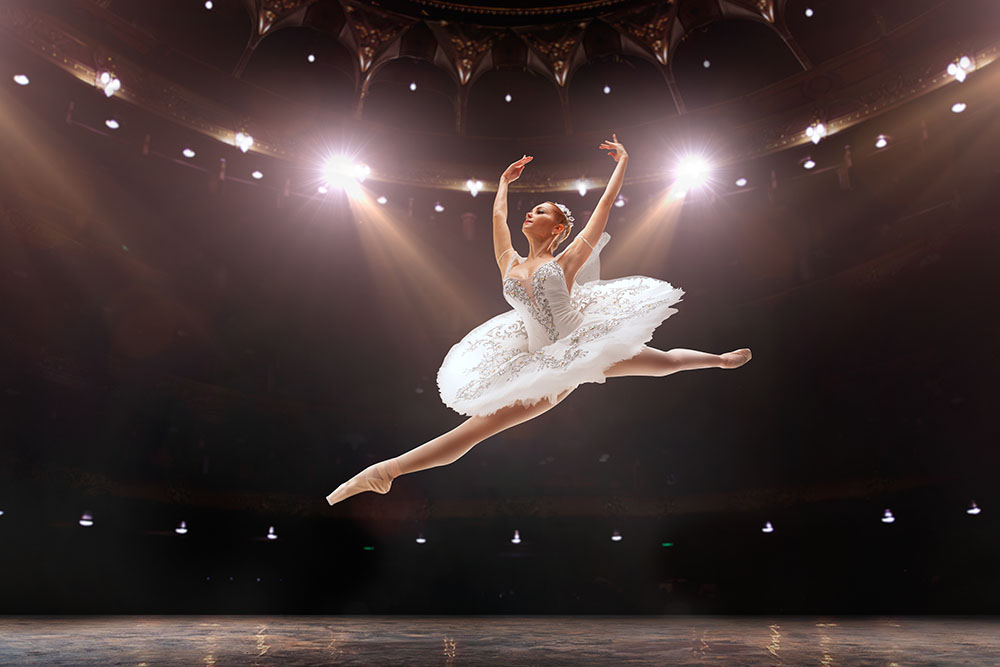 A ballerina jumping.