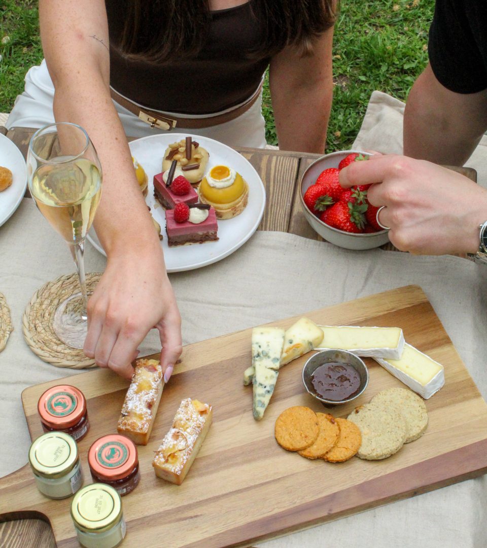 Closeup of couple sharing a Ness Walk Picnic